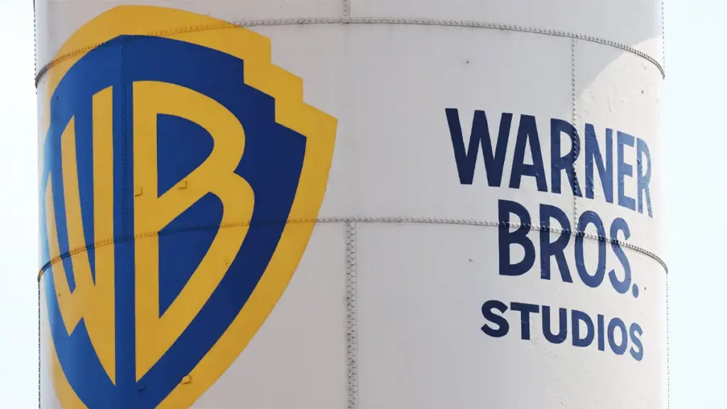 Logo Netflix dan Warner Bros Discovery dengan tanda tanya akuisisi