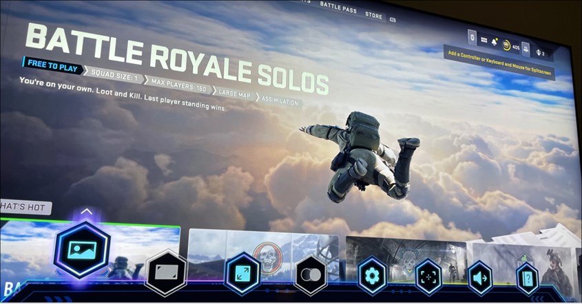 TV Modern dengan Game Mode Aktif TV modern menampilkan Game Mode aktif untuk pengalaman gaming lebih responsif