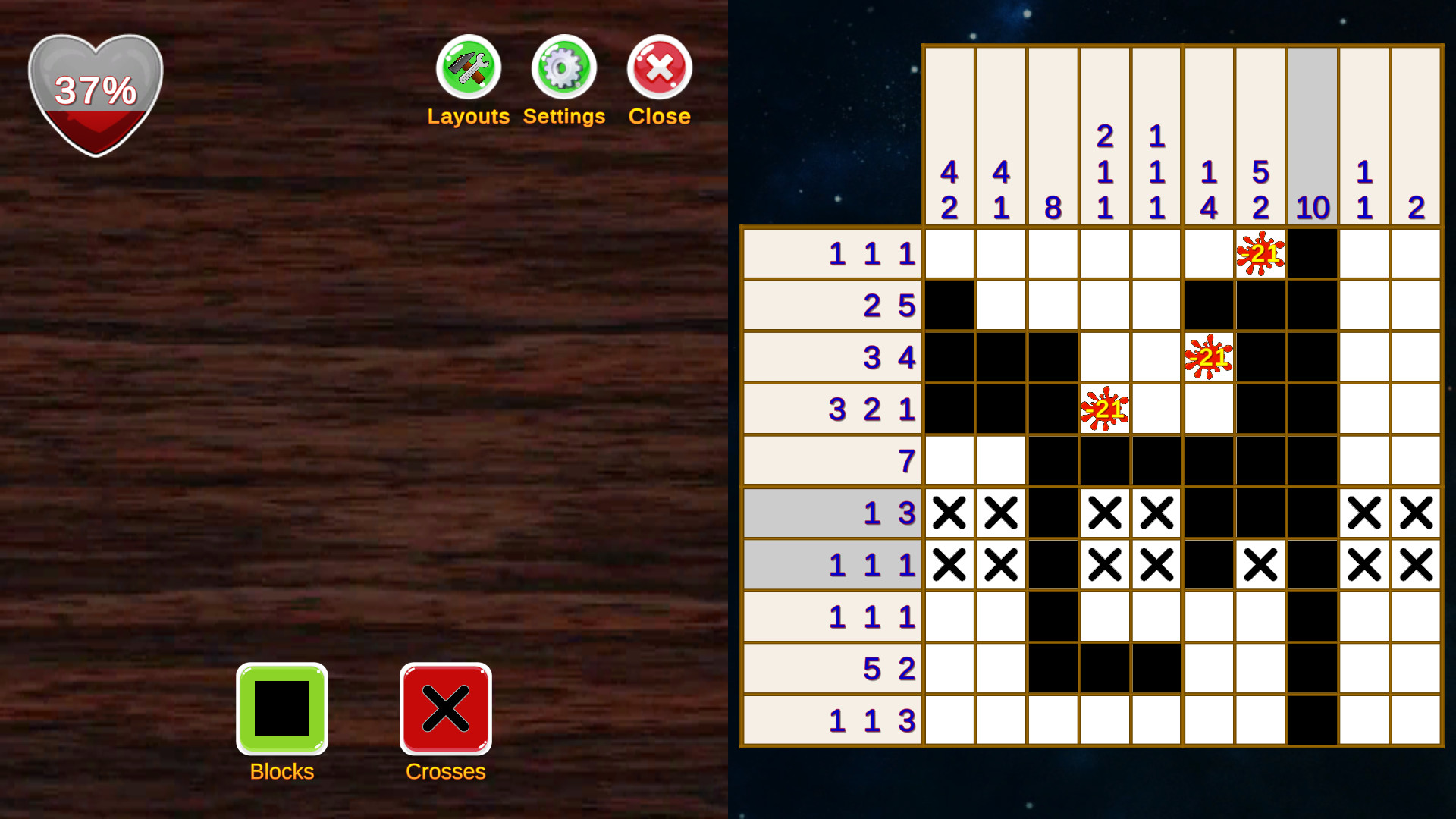 Screenshot Nonogram Kingdom menunjukkan papan puzzle dengan kotak berwarna dan angka petunjuk.